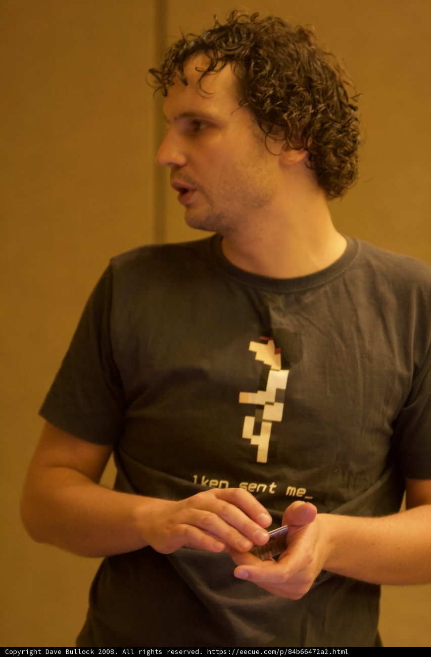 Black Shirted Man with Credit Card