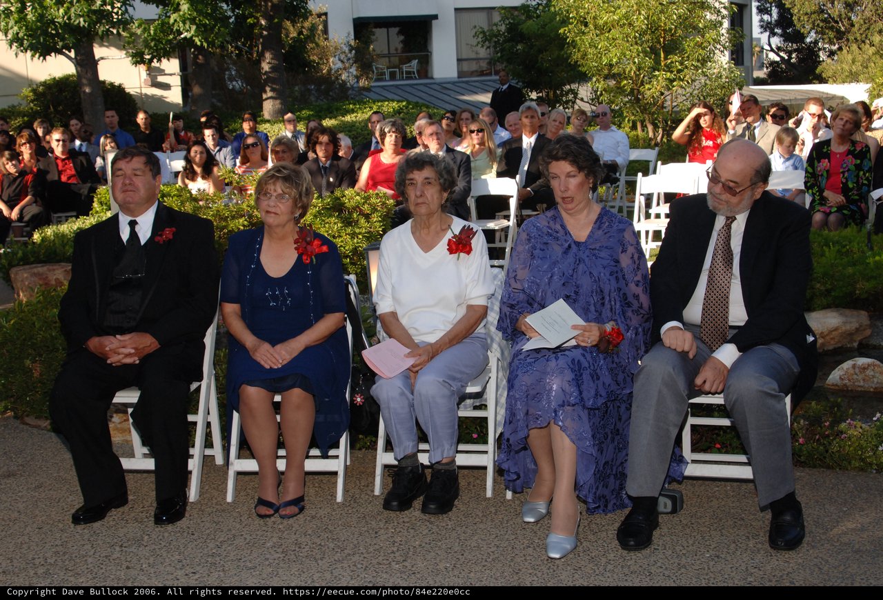Family Members Seated at Outdoor Wedding Ceremony