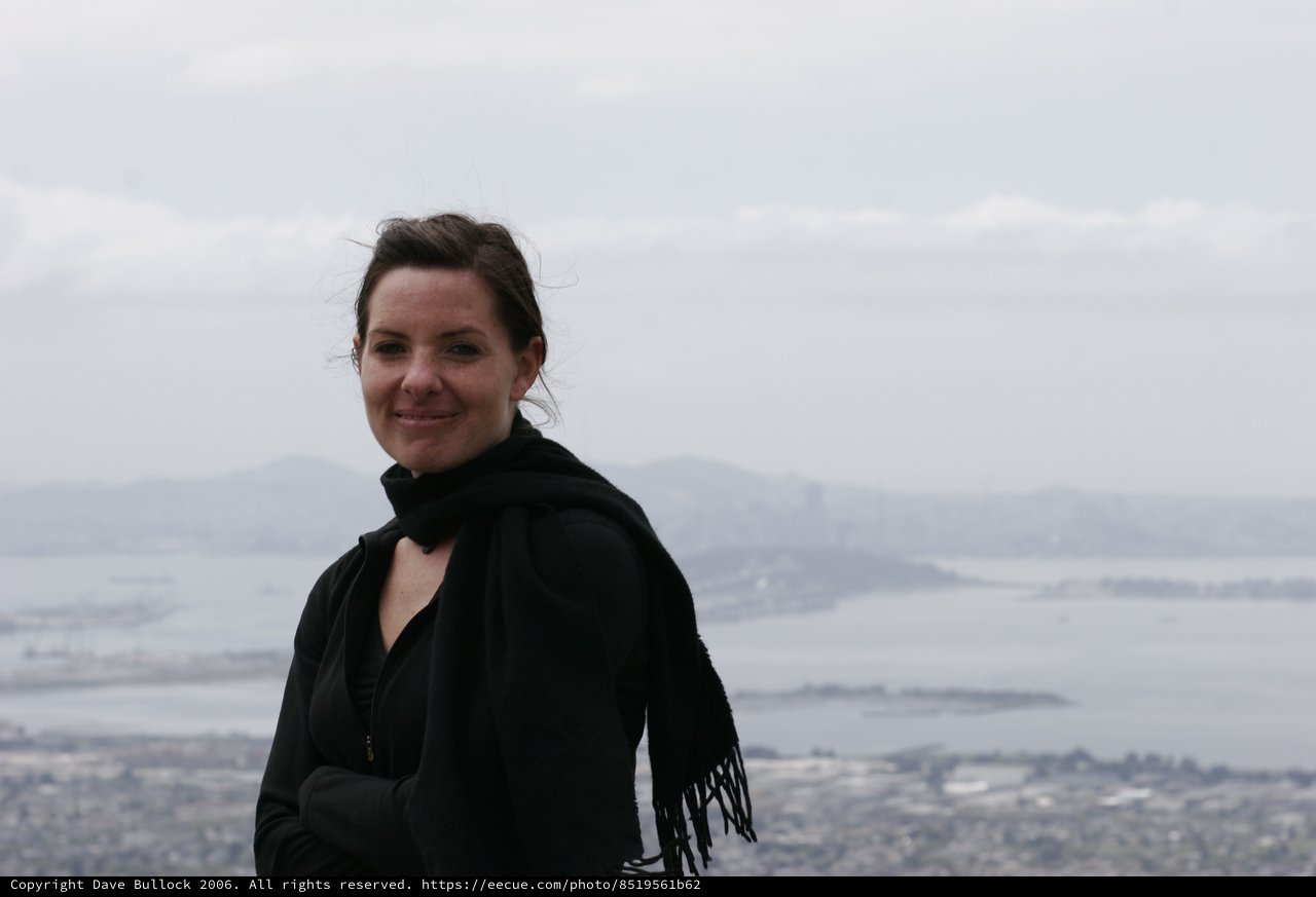 Woman Smiling Against San Francisco Bay Panorama