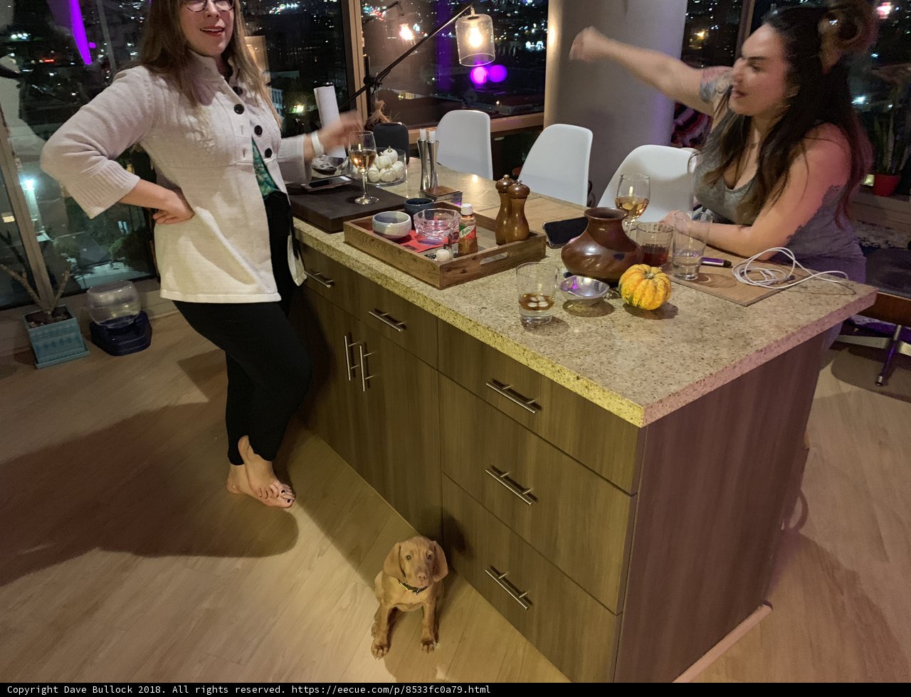 Two Women Gather in the Kitchen
