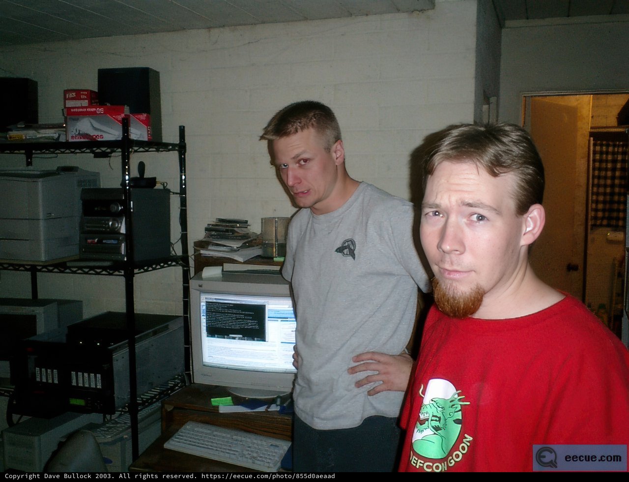 Two Men Collaborating on a Computer Task