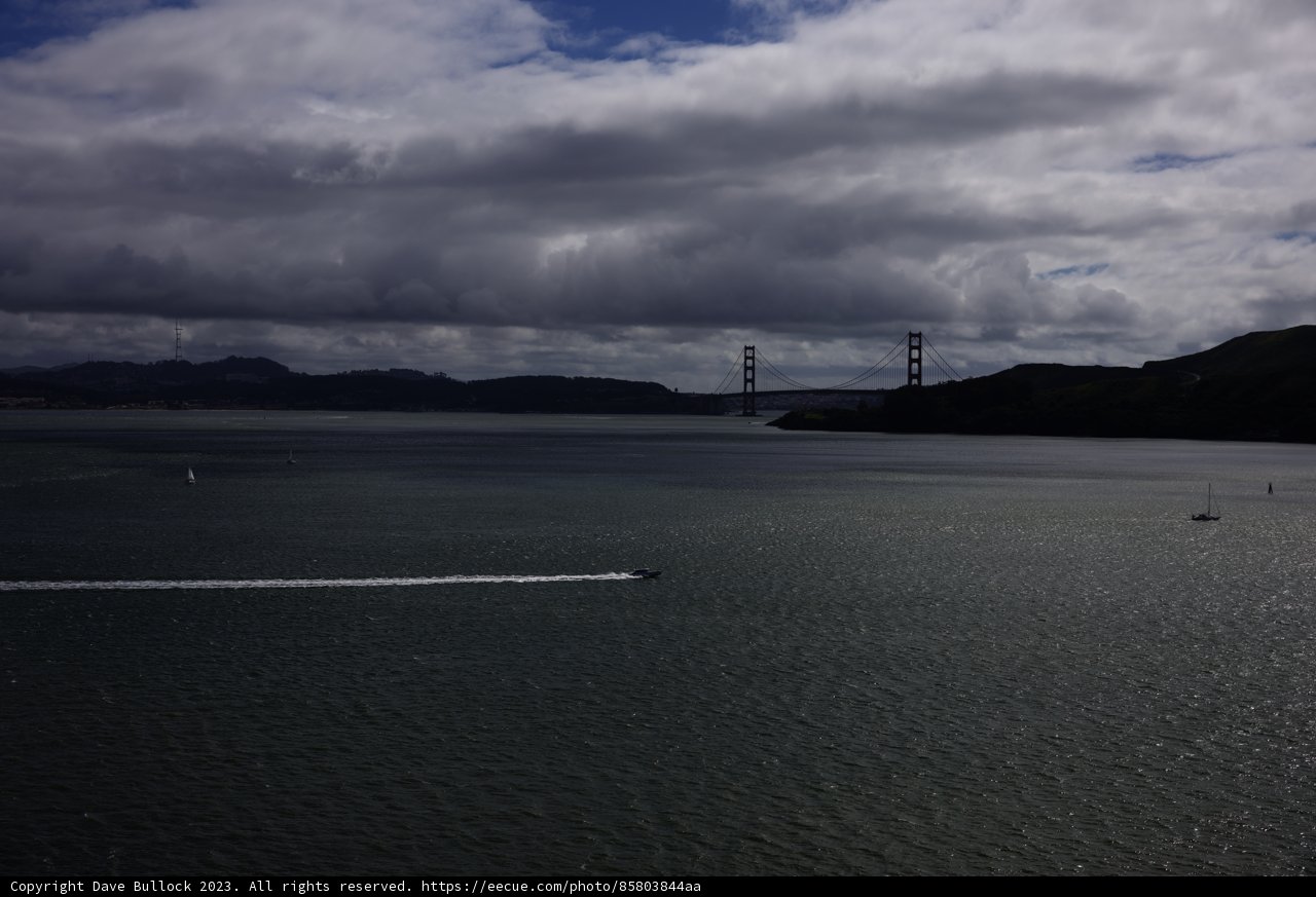 Sailing by the Bridge on a Cloudy Day