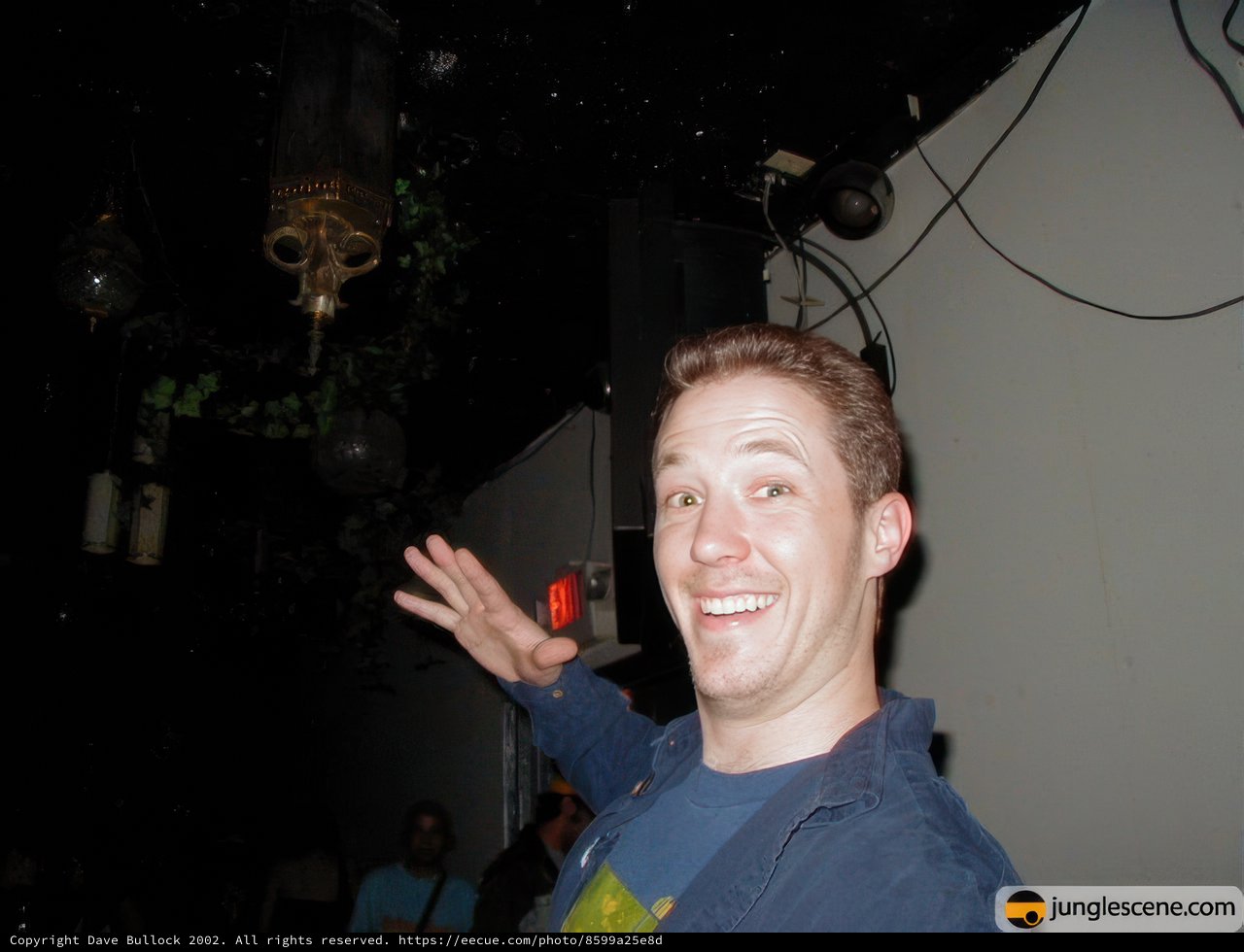 Smiling Andrew T in Night Club