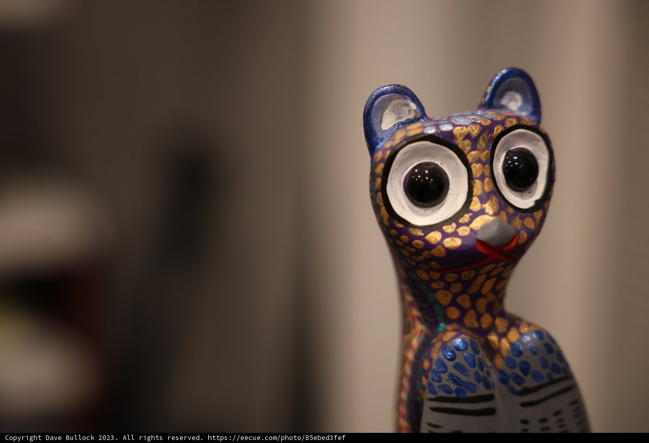 Adorable Cat Figurine with Big Eyes