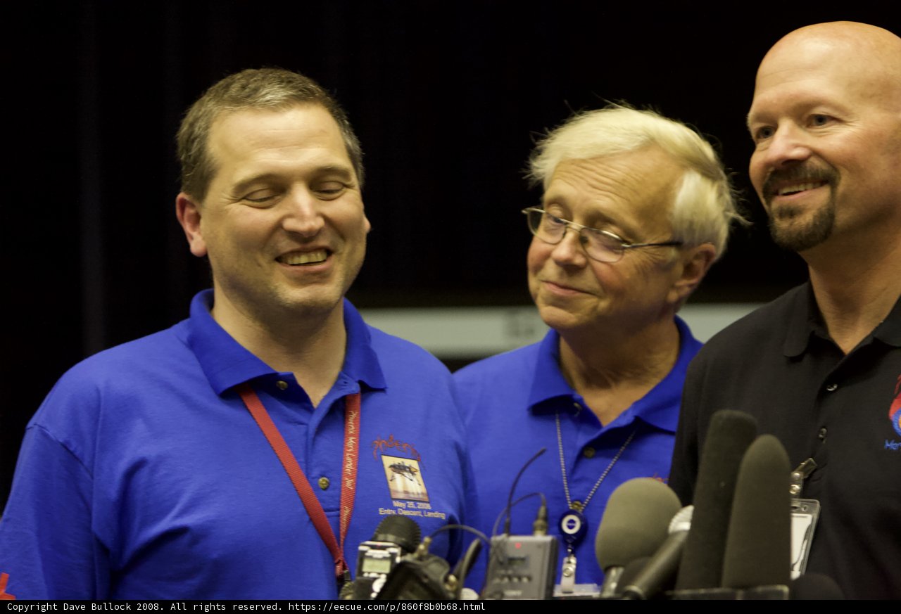 Three Men Discussing Their Success at Phoenix Post Interview