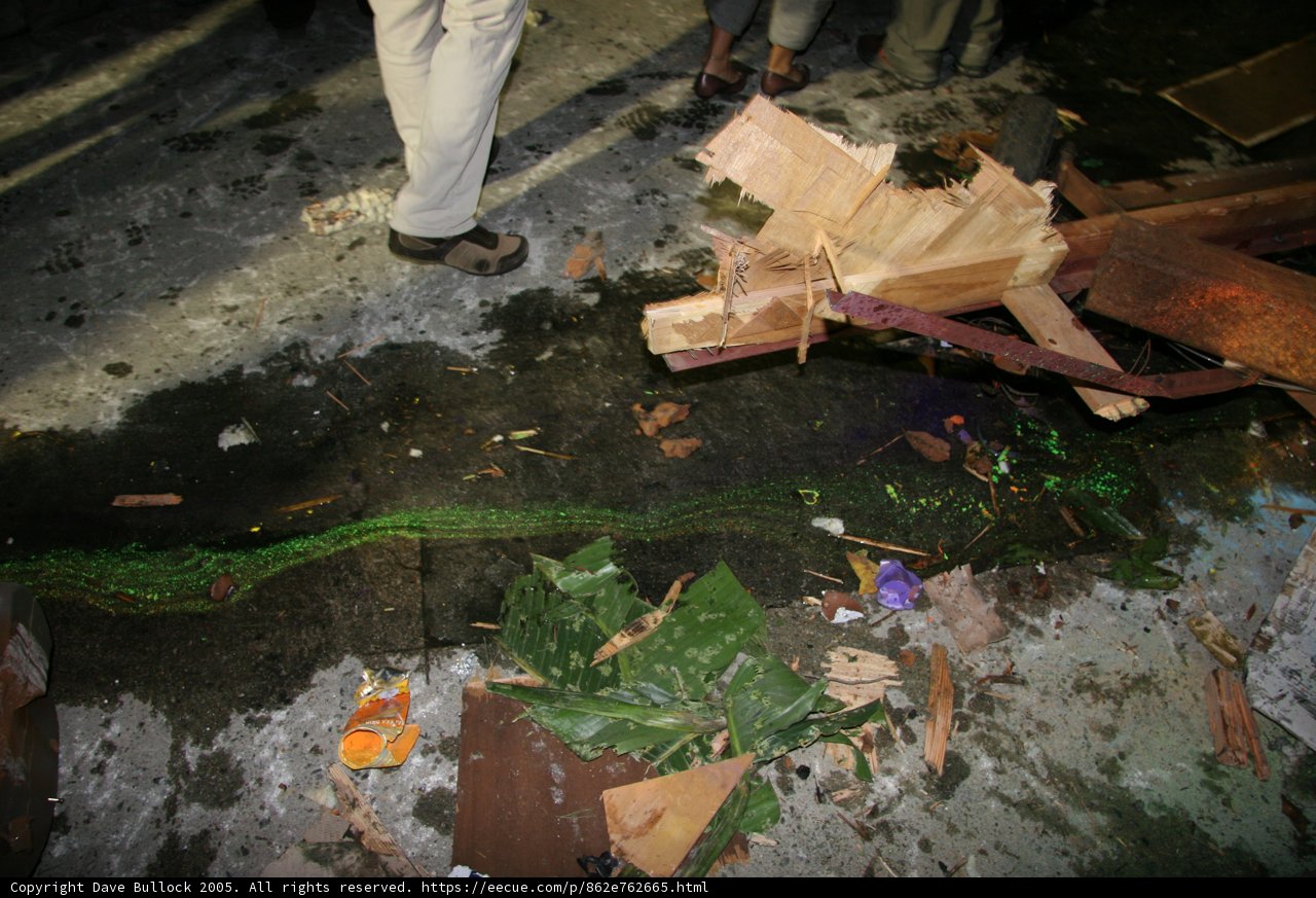 Man Standing Amid Debris