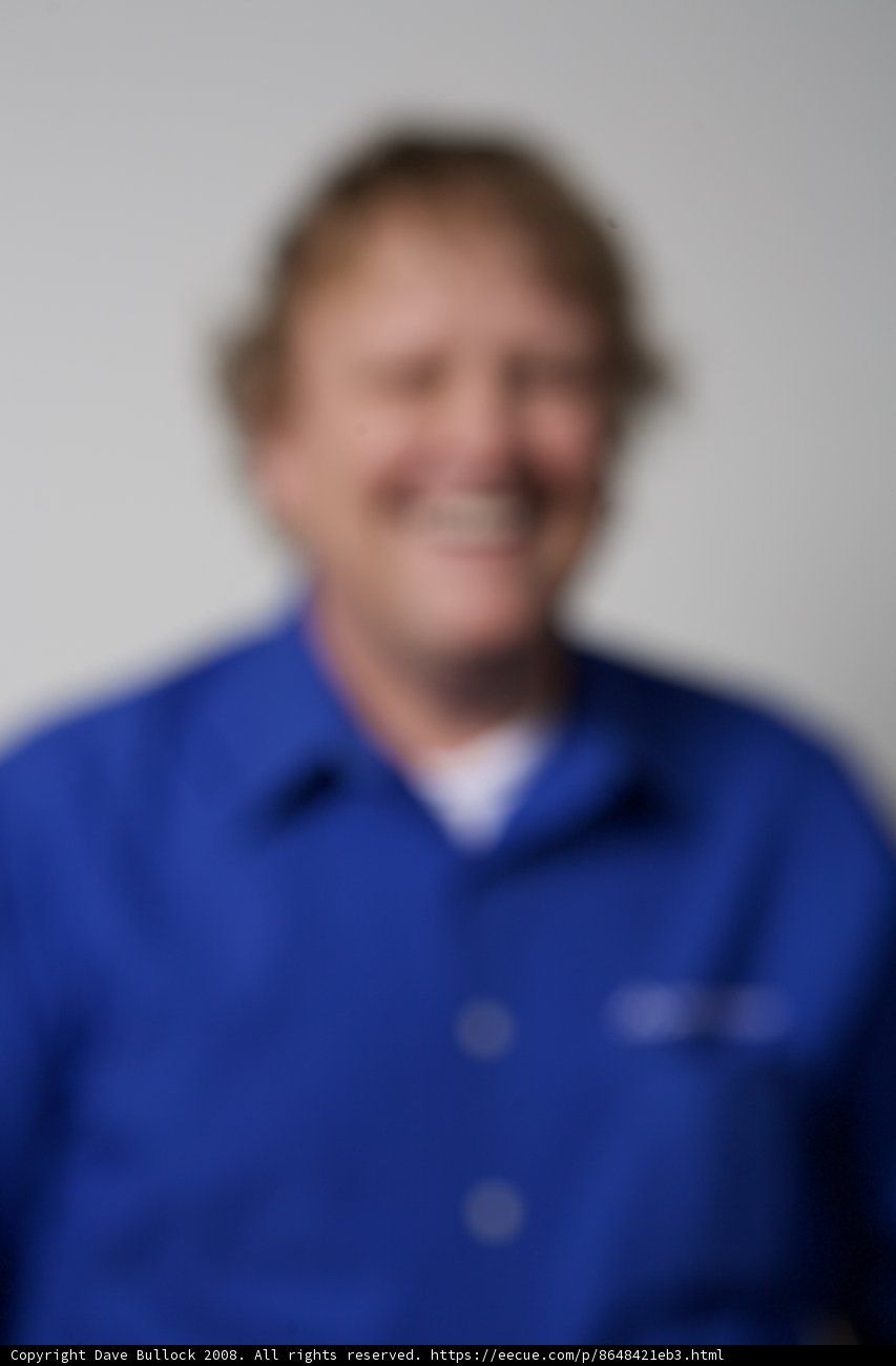 Blurry Portrait of a Happy Man in Formal Wear