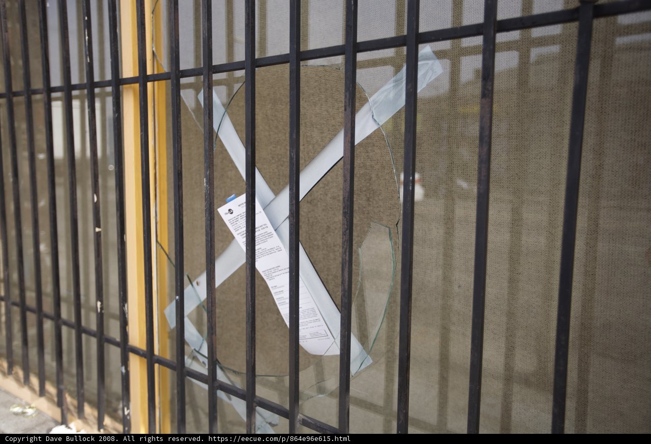 Warning Sign on Prison Fence
