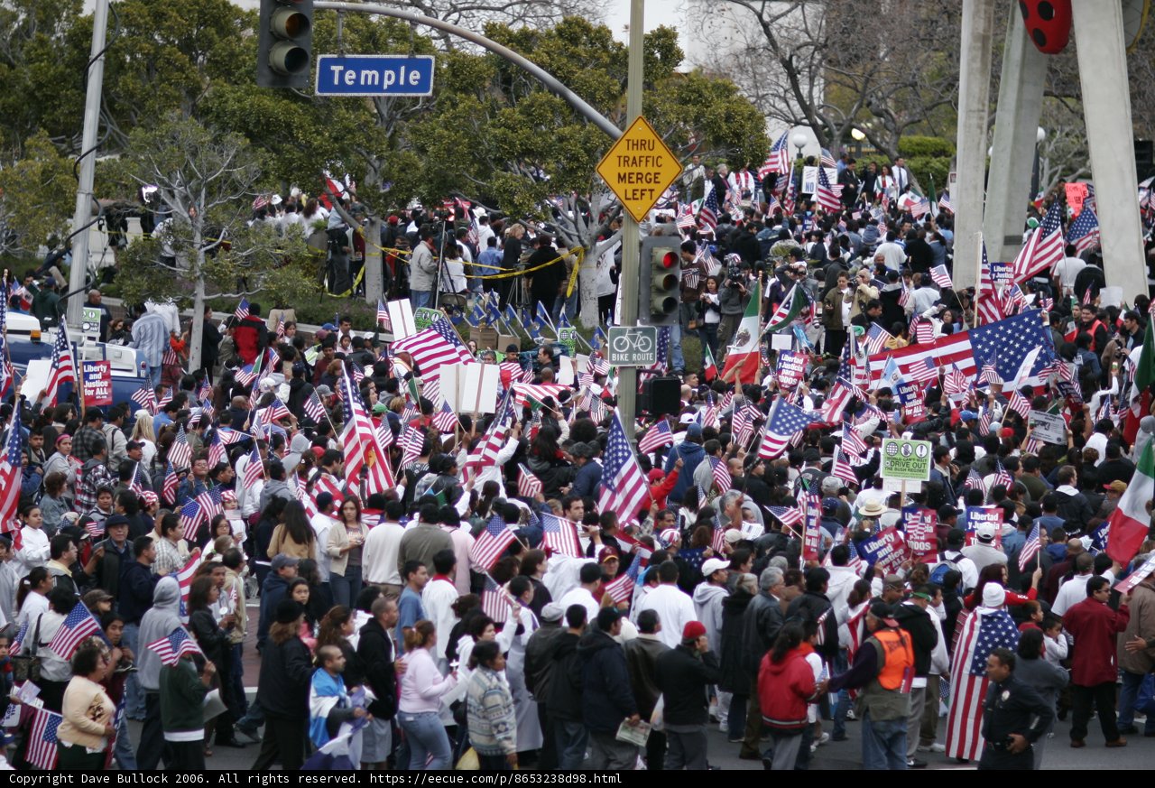 Patriotic Crowd holding American Flags