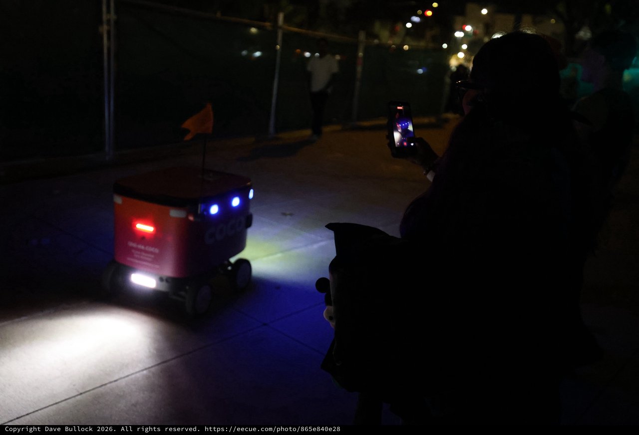 Coco Delivery Robot Navigates Night Festival Sidewalk
