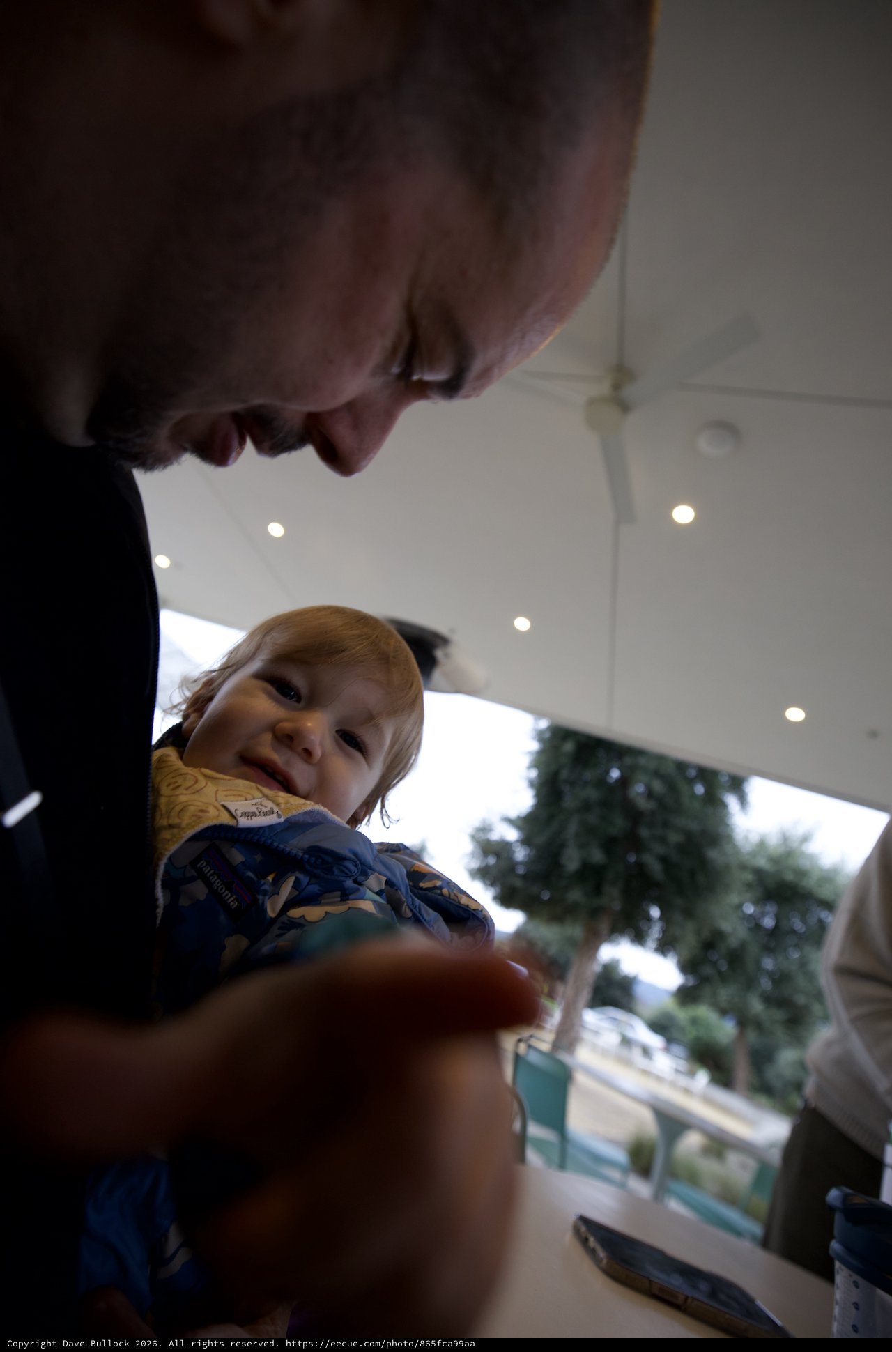 Father and Child Sharing a Joyful Moment Indoors