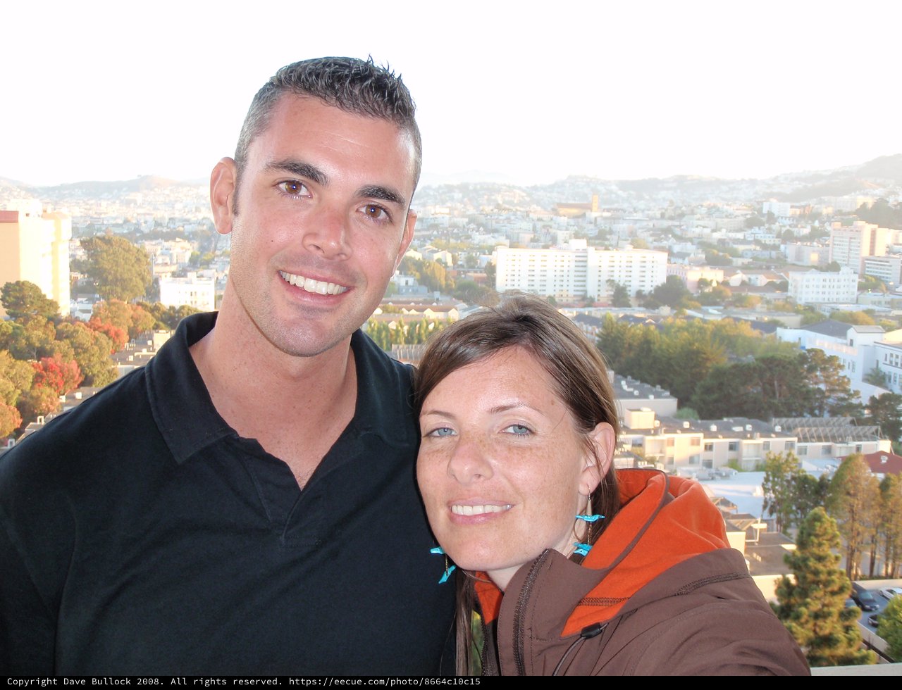 Couple Smiling Against San Francisco Cityscape Panorama