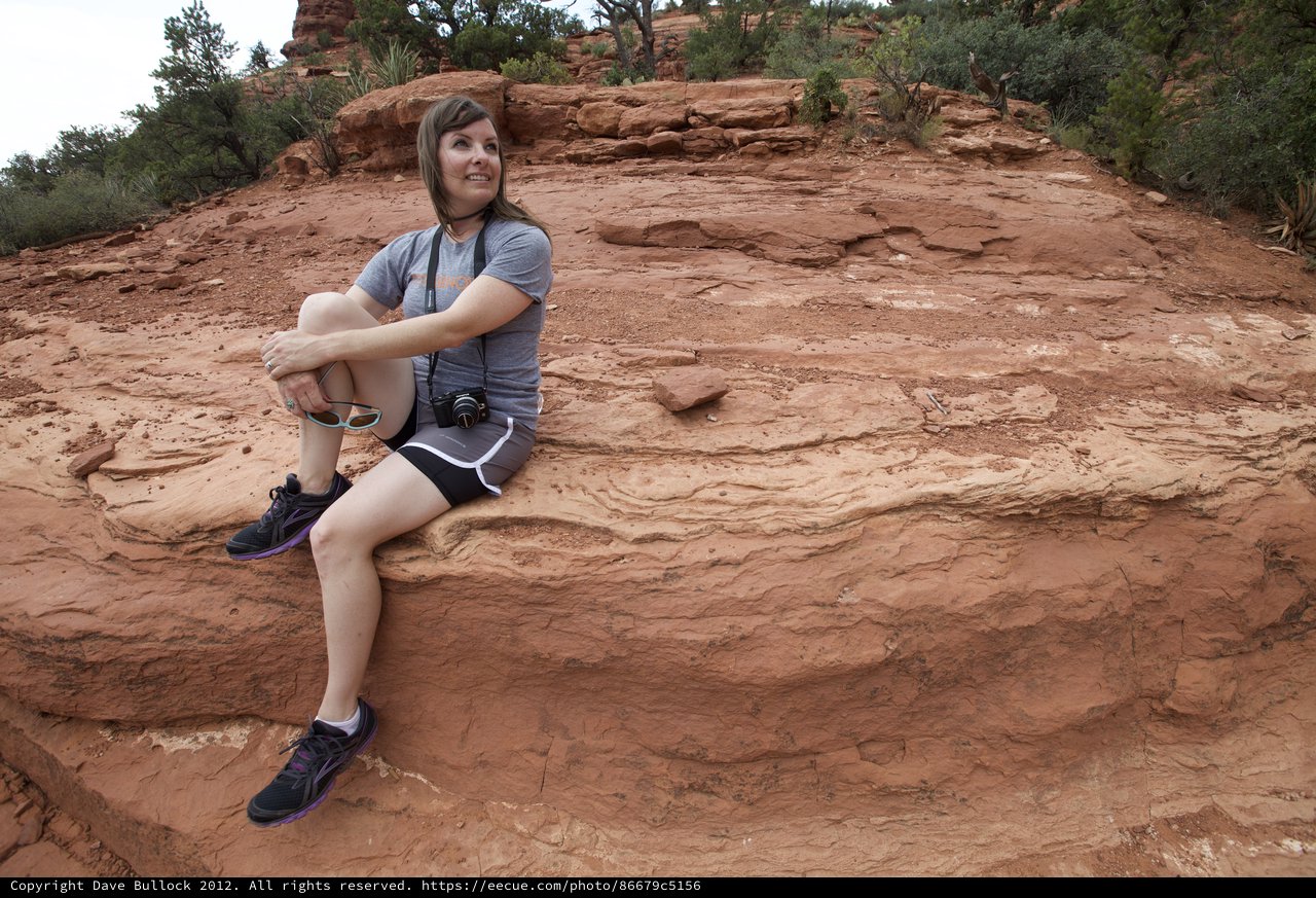 Hiker Resting on Red Rock Formations in Sedona