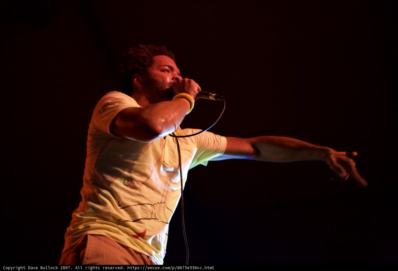 Coachella Performer Takes the Stage with Microphone in Hand
