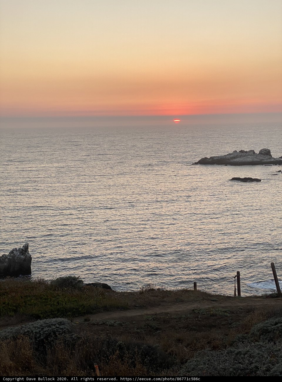 Lighthouse Silhouette at Sunset