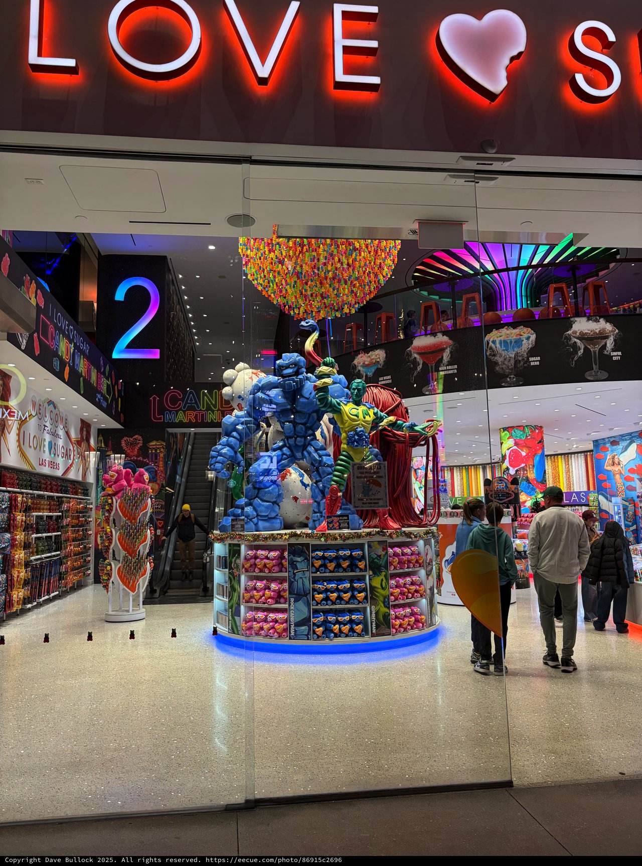 Colorful Candy Store Display with Blue Balloon Sculpture