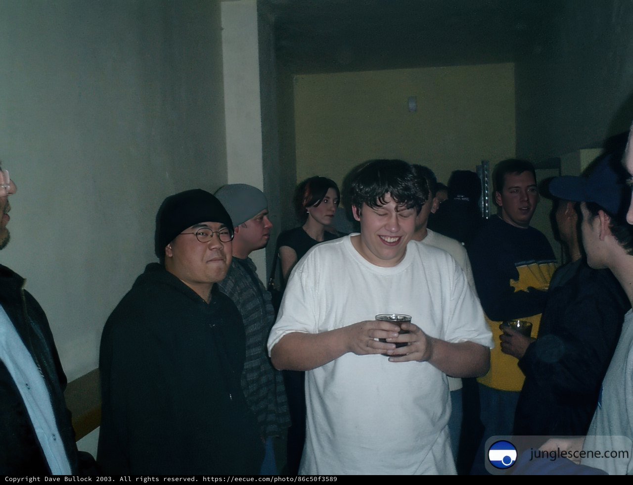 Group of People in Urban Hallway