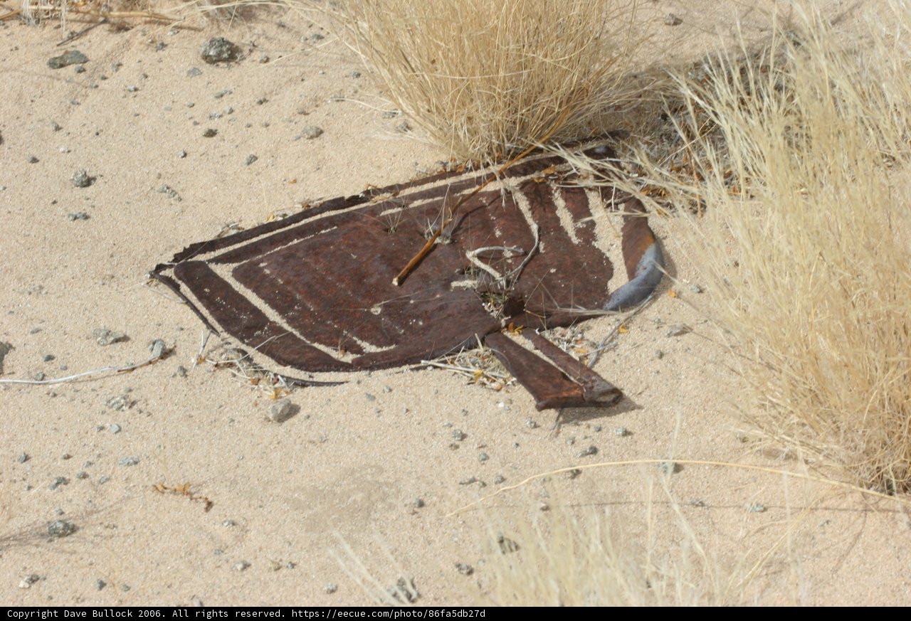 Rusty Relic Resting in the Sand