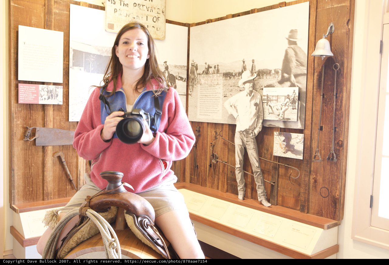 Photographer Poses on Saddle at Western Heritage Museum