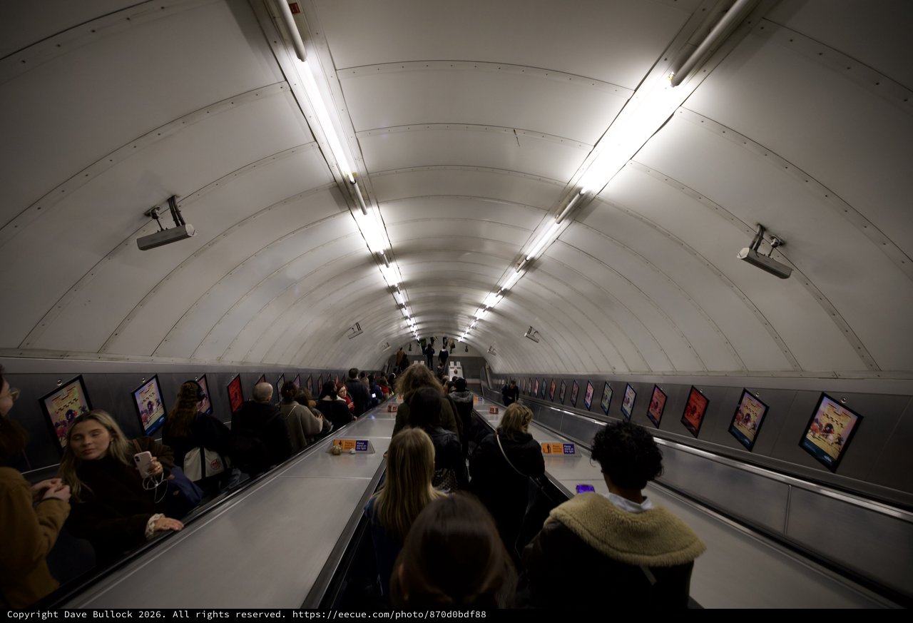 Commuters on London Underground Escalator During Morning Rush