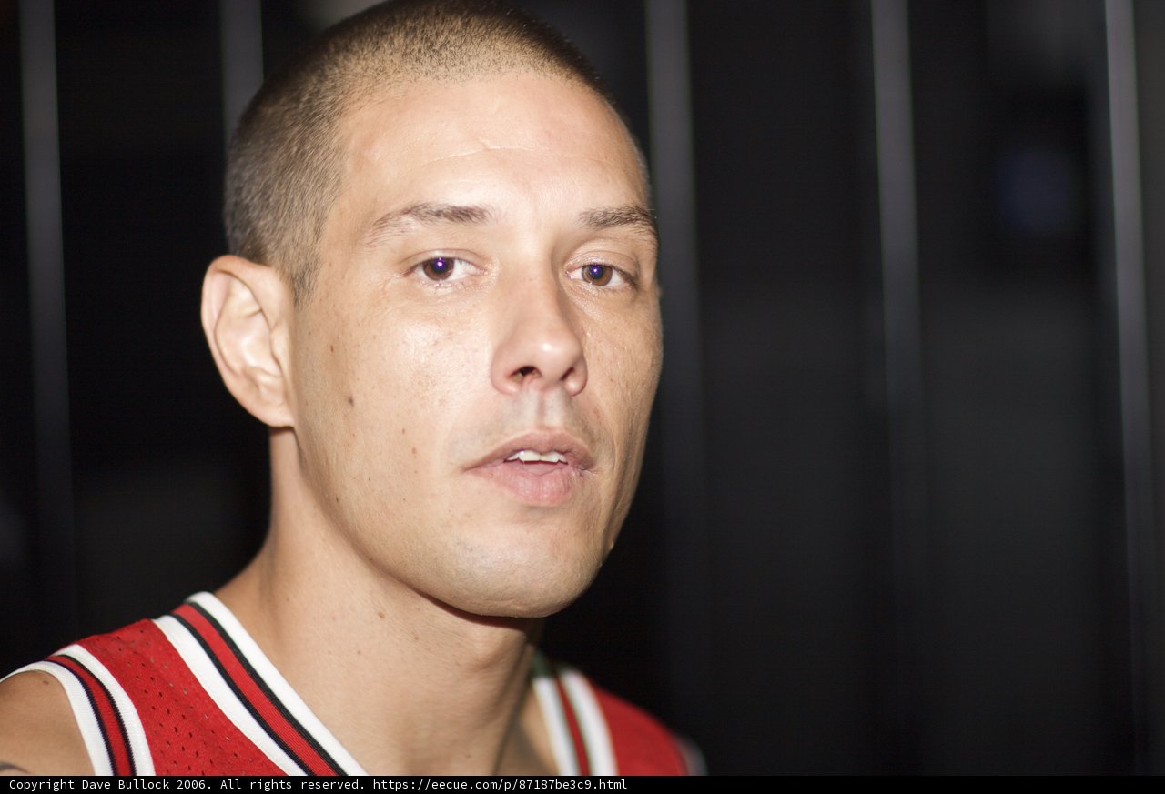 Red Jersey and a Shaved Head
