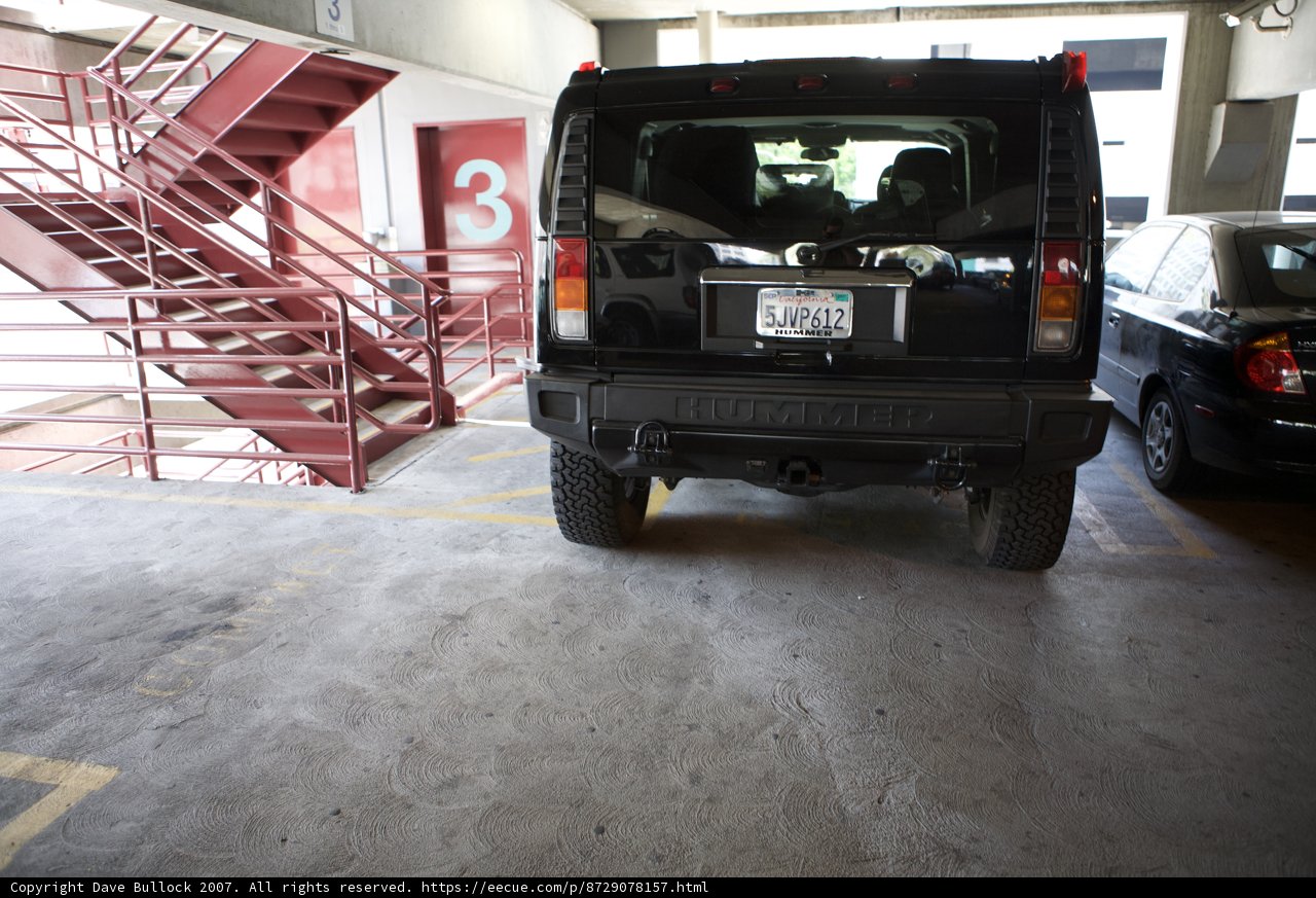 Black Jeep in a Parking Garage