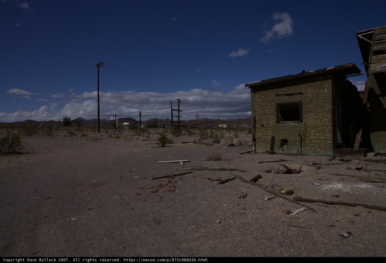 Desert Shack with Three Utility Poles