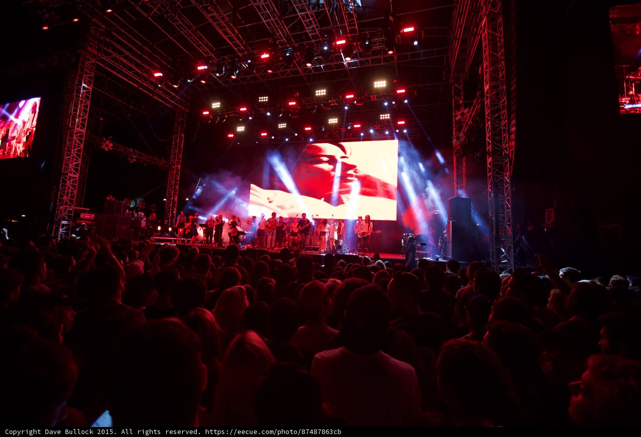 Belle and Sebastian Wide Stage Video Screen Romantic Photographer Visible Red Lighting Crowd
