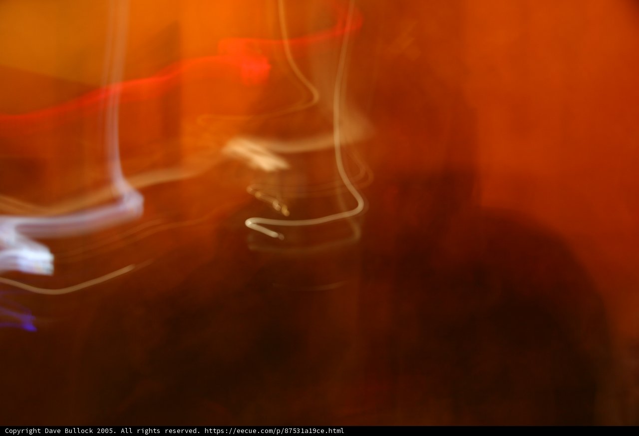 Blurry Figure in Smoke-filled Room