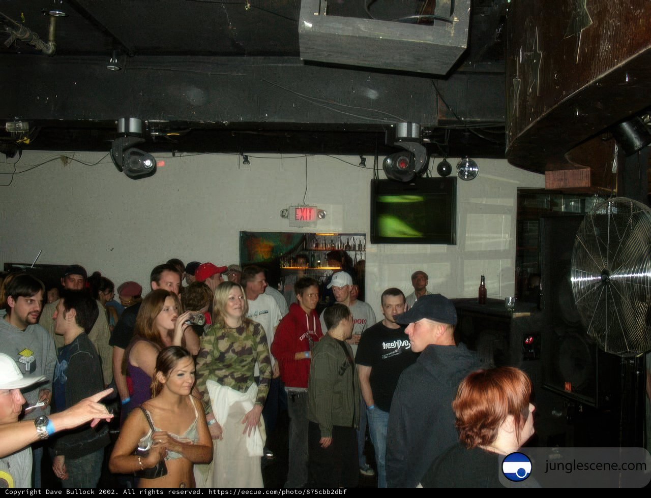 Nightclub Crowd Watches Television