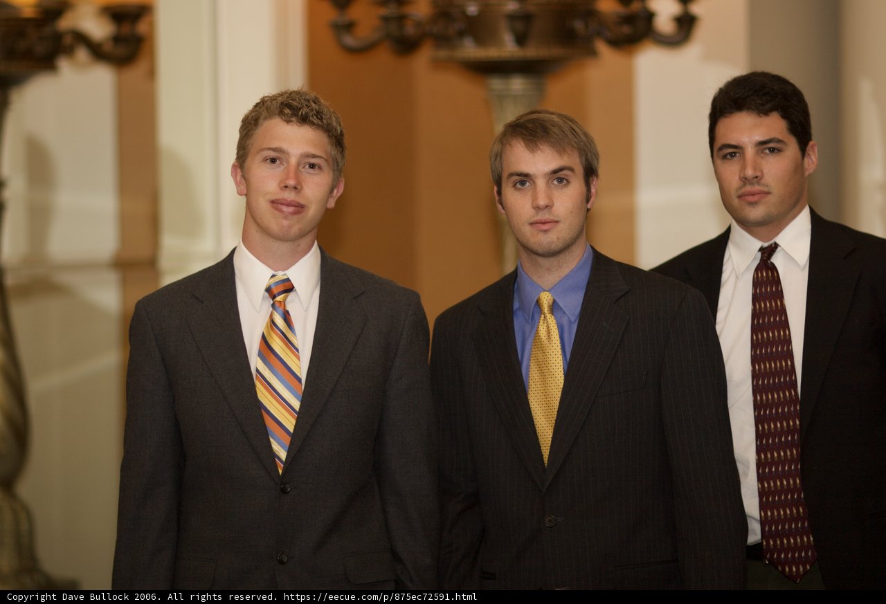 Three Suited Men Posed Together