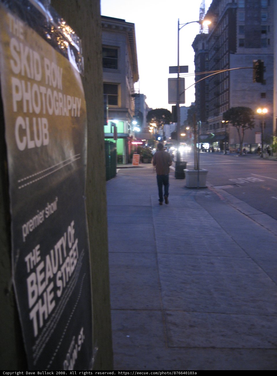 City Poster on Busy Sidewalk