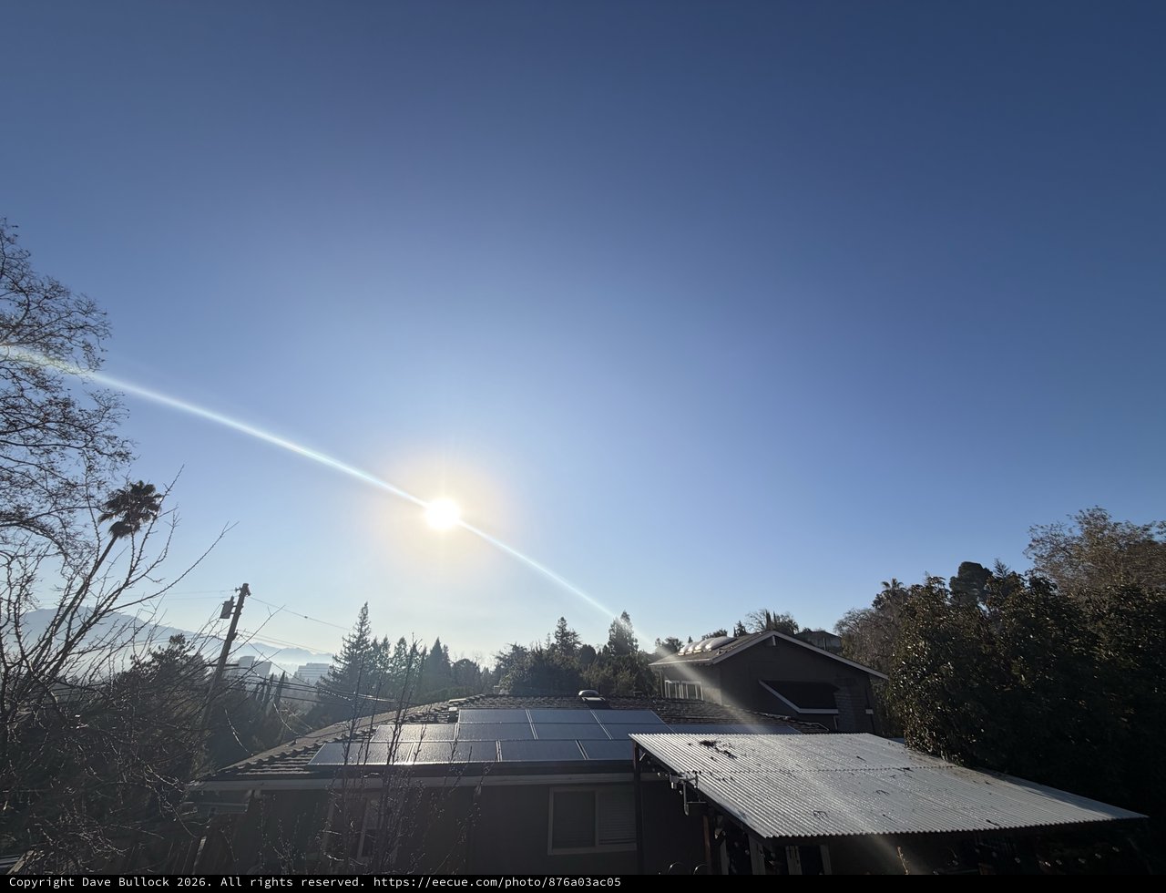 Solar Panels and Suburban Sunset in California Neighborhood
