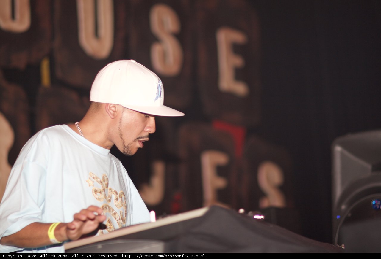 Man with Baseball Hat Takes the Stage