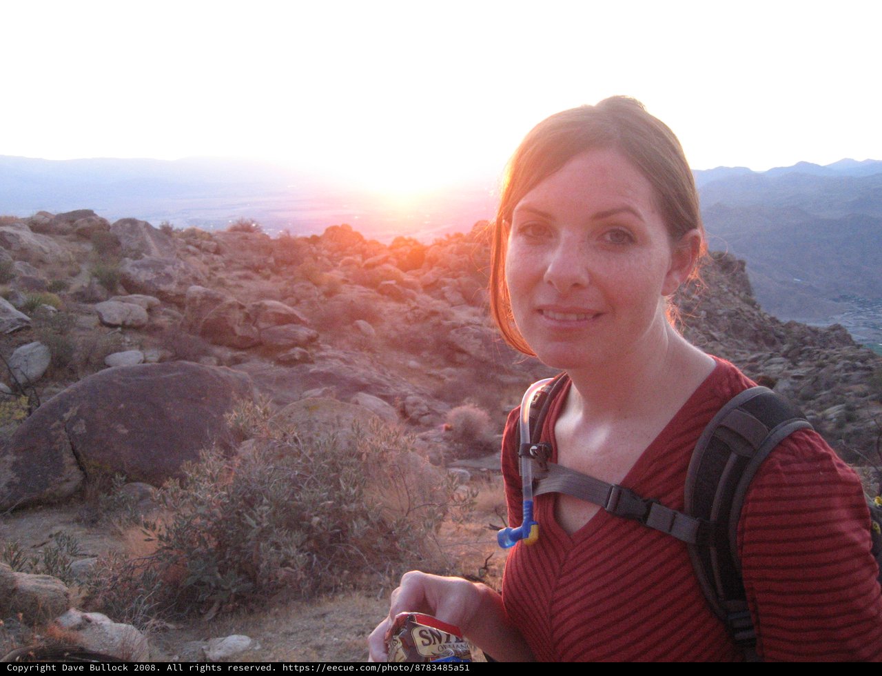 Hiker Pauses at Sunset on Desert Mountain Trail