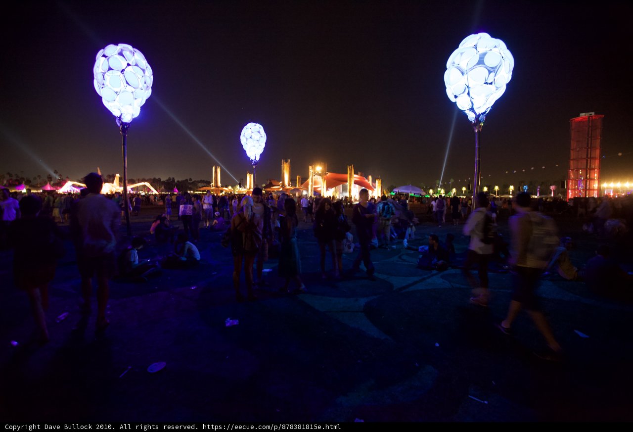 Nighttime Crowd with Balloons at Cochella Festival