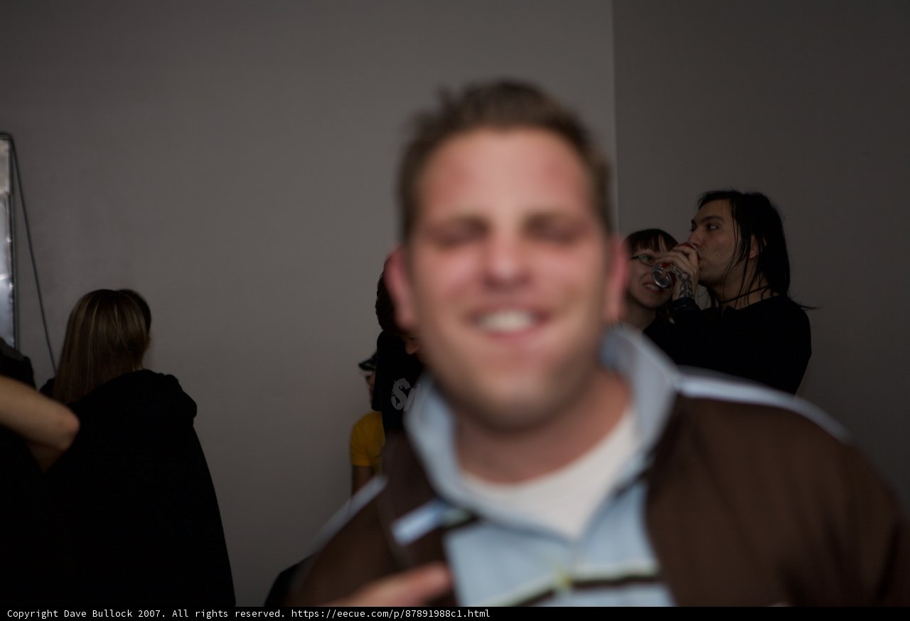 Smiling Man with Friends