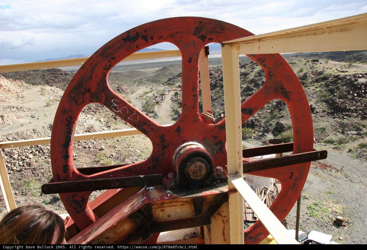 Red Wheel on Rustic Machine