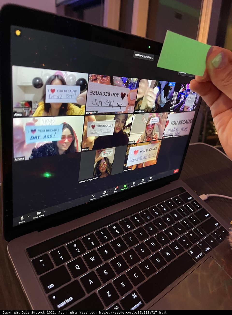 Green Card in Front of Laptop