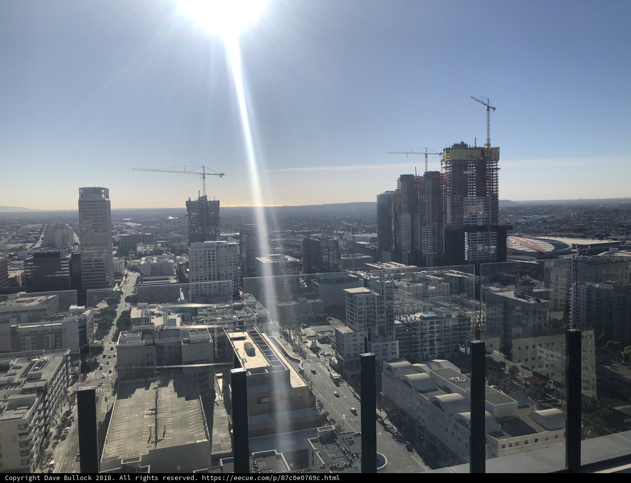 Bright Sun over the City Skyline