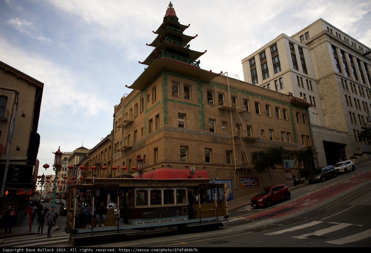 Vivacity of Urban Life: A Trolley Car in Chinatown