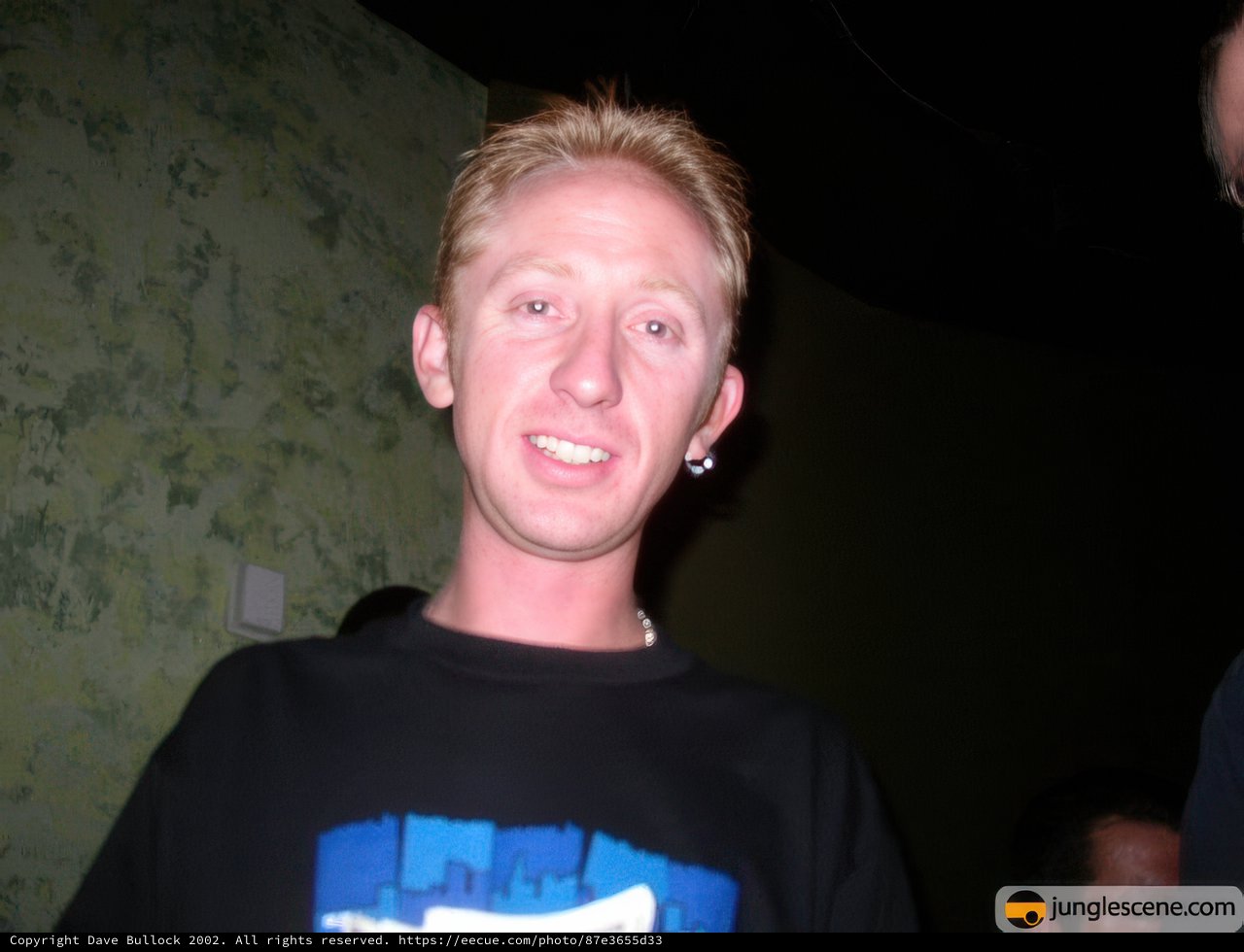 Blonde Man in Black Shirt