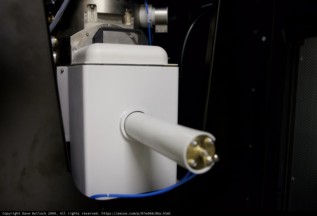 White Machine with Blue Wire