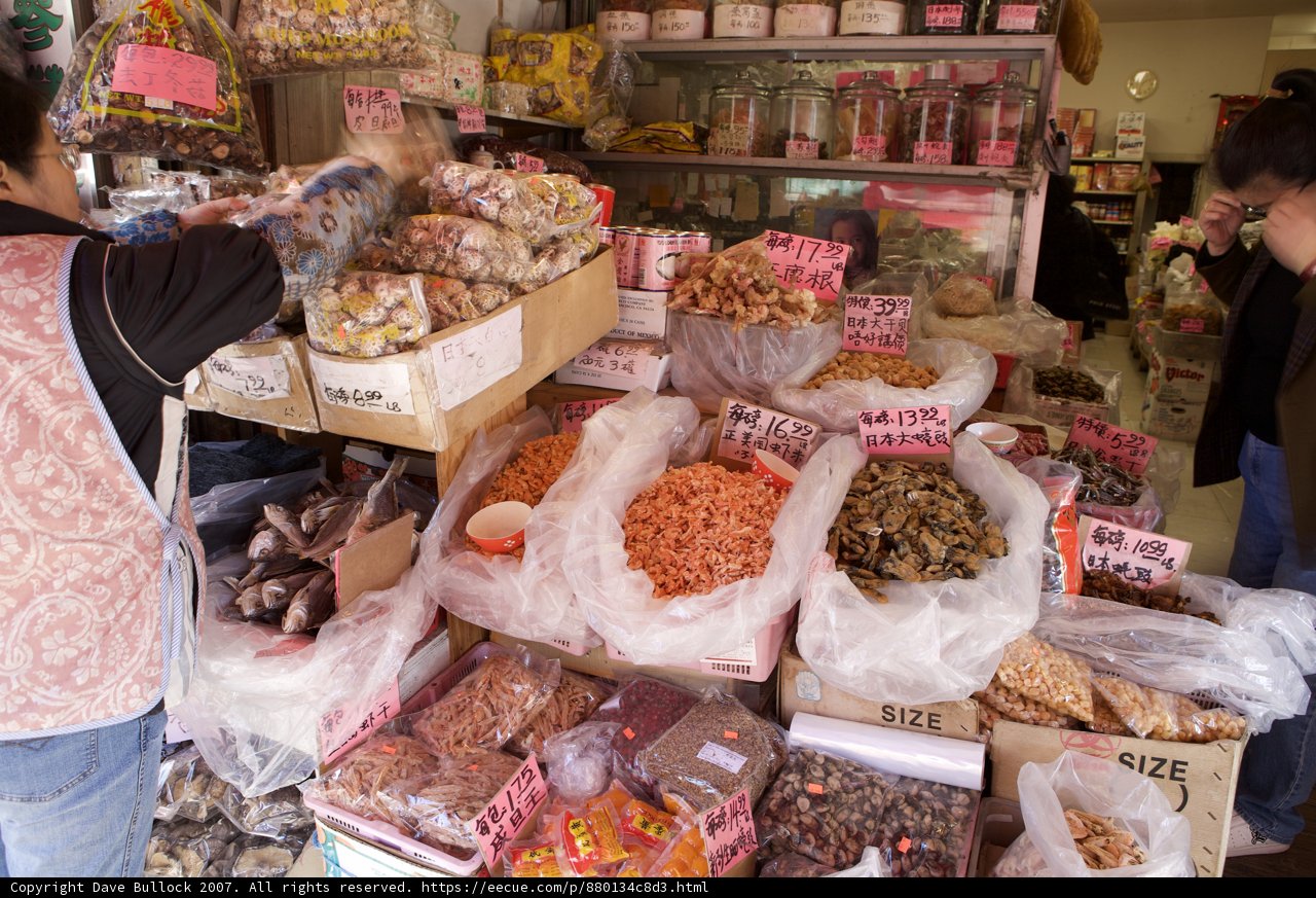 Shopper Checking Out Local Delicacies