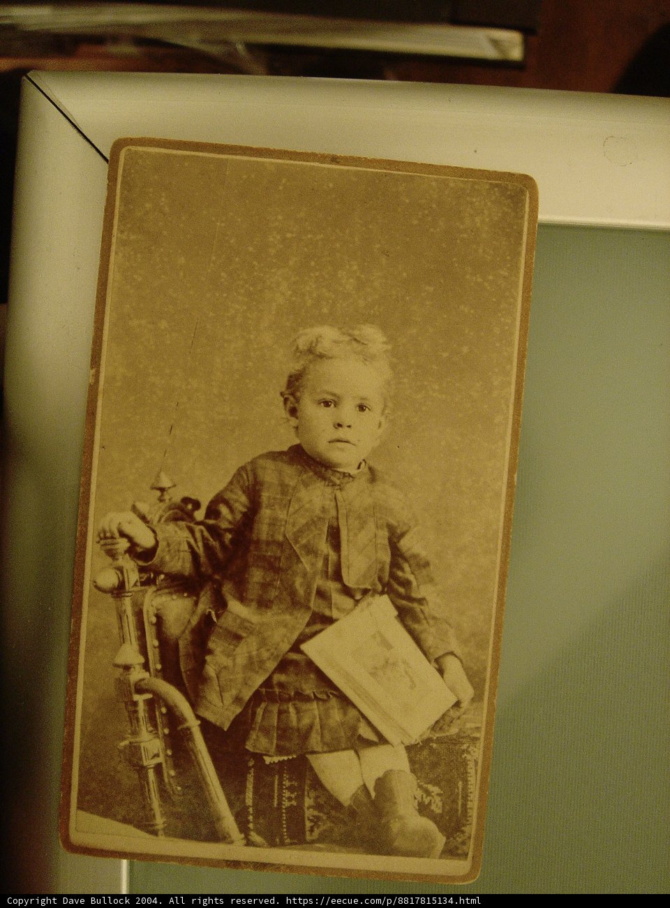 Little Girl in a Vintage Chair
