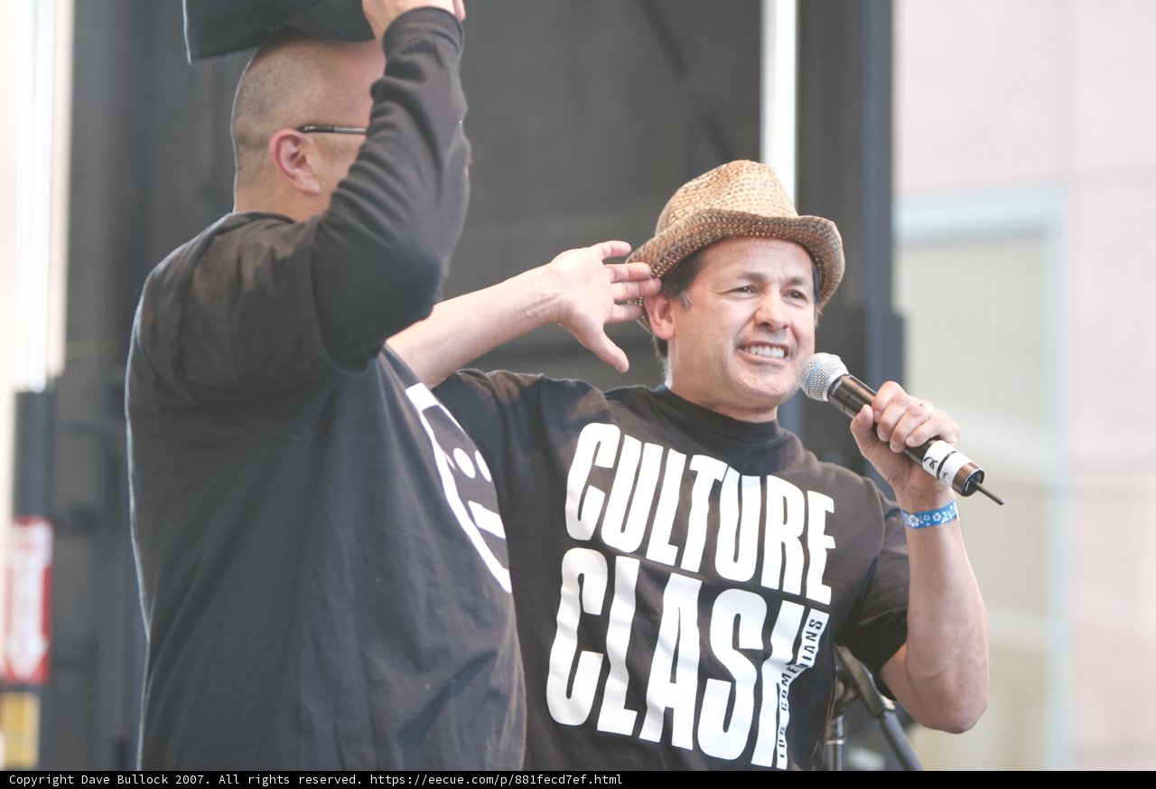 Two Men with Microphones at Grand Performances Ozomatli