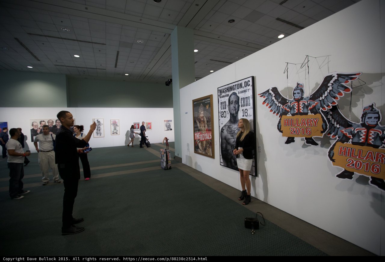 Ted Cruz poses in front of modern art wall