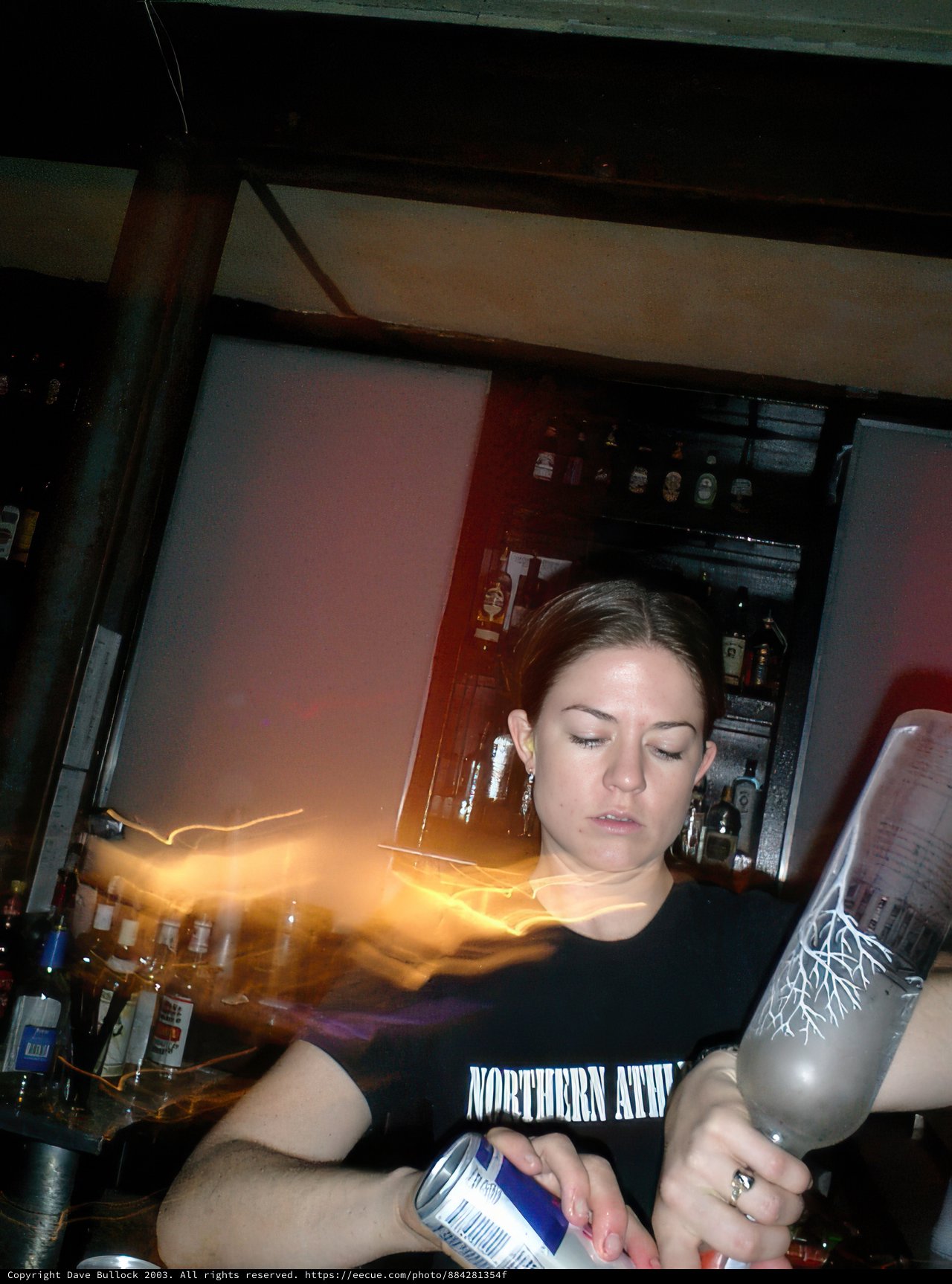 Bartender serving refreshing stout