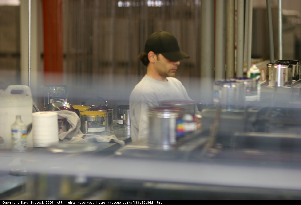 Factory Worker in Baseball Cap