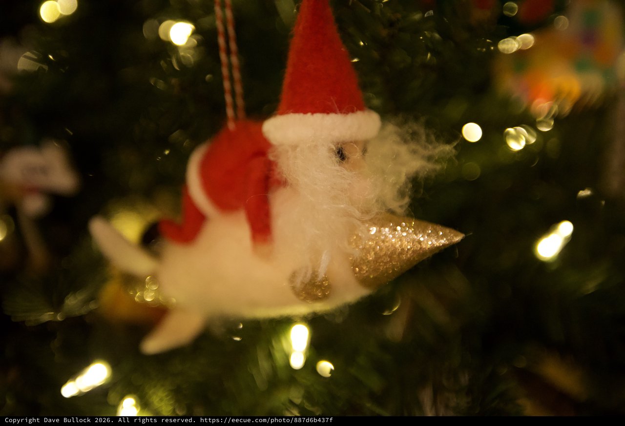 Santa Claus Ornament with Golden Ice Cream Cone